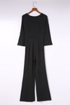 Twisted Plunge Three-Quarter Sleeve Jumpsuit